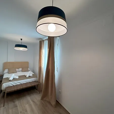 Edificio Amarillo En El Barrio Апартаменты